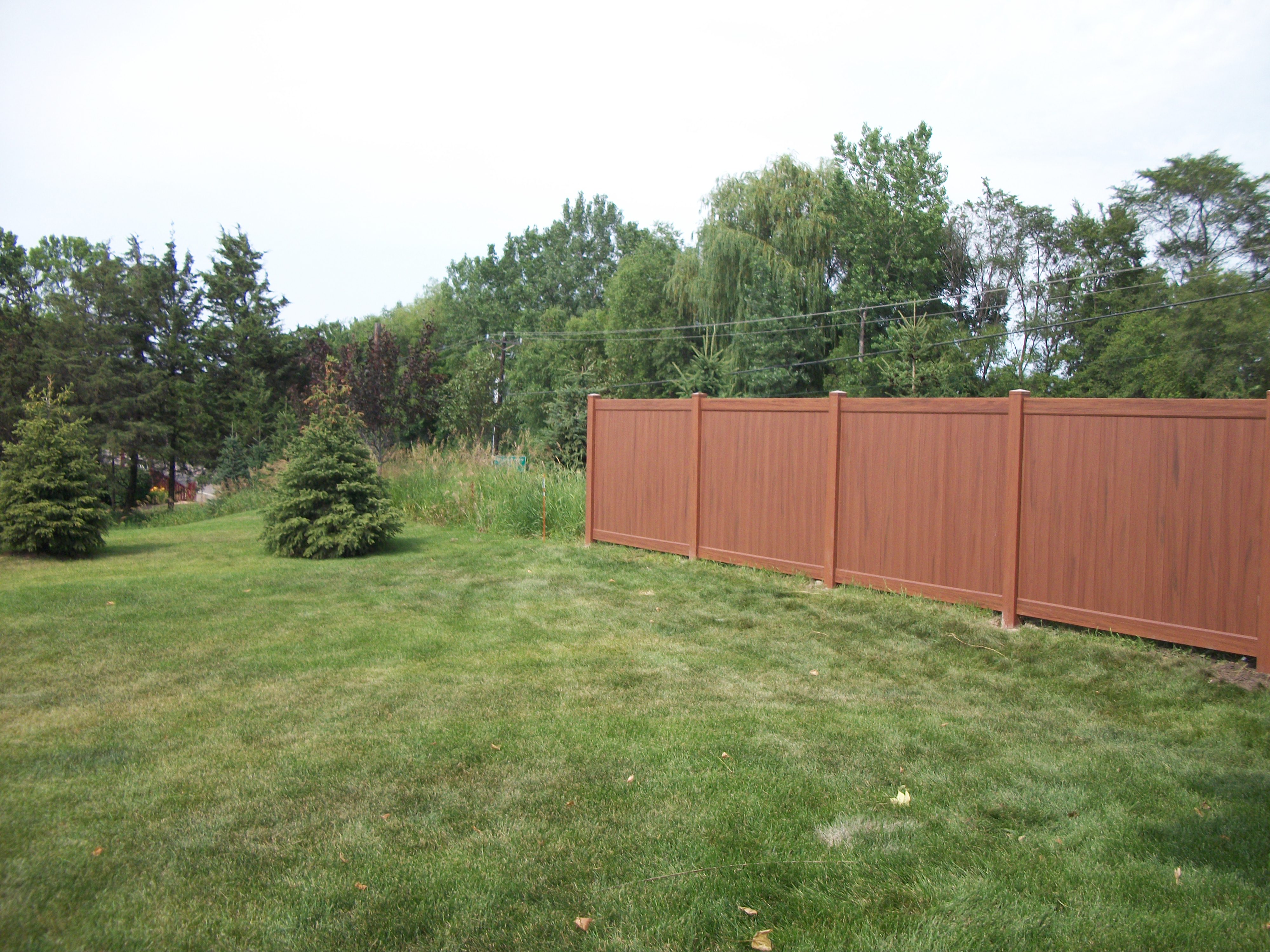 Mocha-Walnut Vinyl Privacy Fence