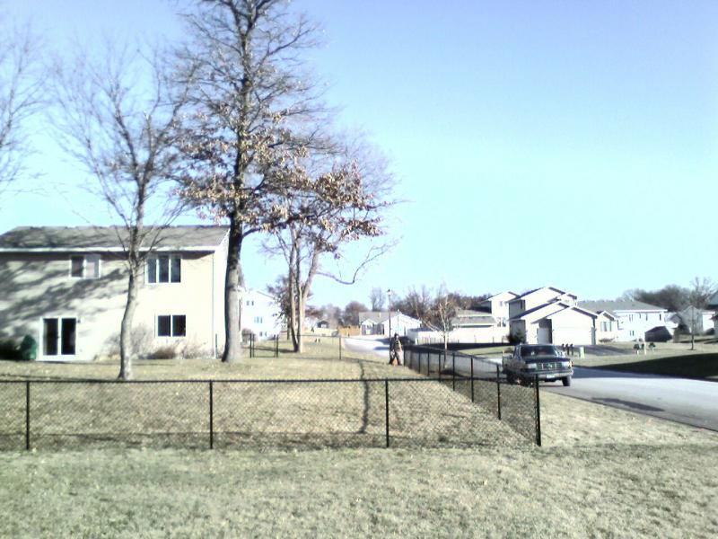 Black vinyl chain link fence installation Coon Rapids, Minnesota