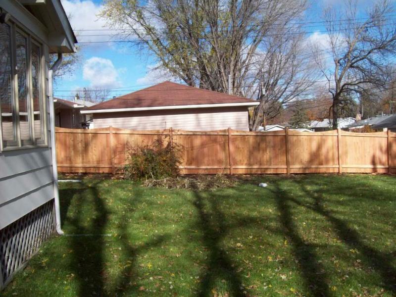 Cedar Scalloped Privacy Fence Installation Edina, Minnesota