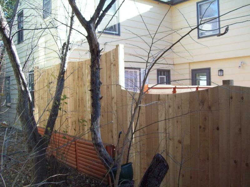 Cedar Scalloped Privacy Fence Installation Minneapolis, Minnesota