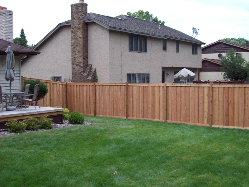 Cedar framed batten board privacy fence installation New Brighton, Minnesota