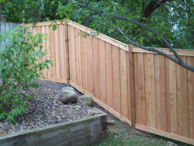 Cedar framed batten board privacy fence installation Roseville, Minnesota