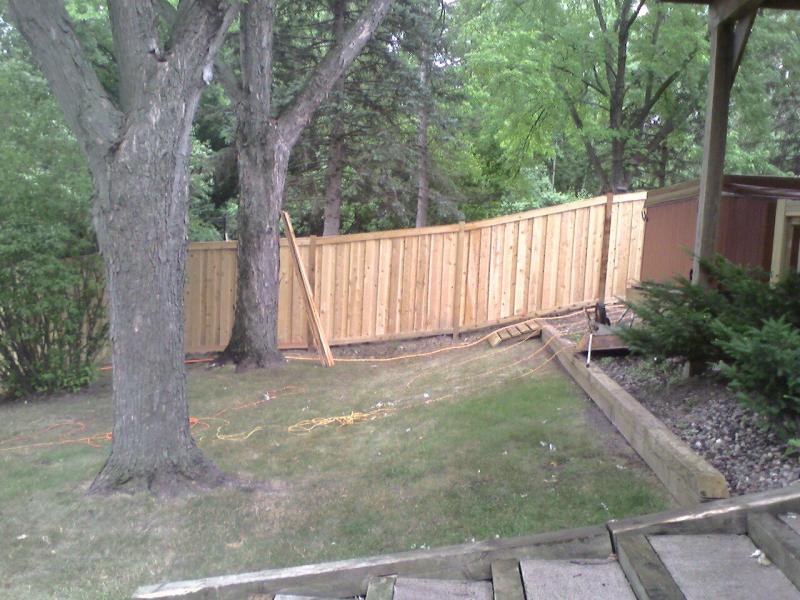 Cedar framed batten board privacy fence installation Minnetonka, Minnesota