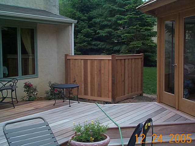 Cedar framed batten board privacy fence installation New Brighton, Minnesota