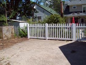 Dog eared vinyl picket fence installation Minneapolis, Minnesota