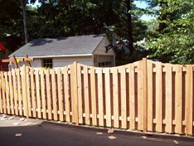 Cedar scalloped alternate board privacy fence installation Edina, Minnesota